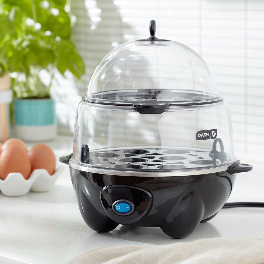 DASH double-decker trays loaded with eggs demonstrating 12-egg capacity for meal prep