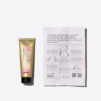 Davines paste texture close-up showing creamy consistency for easy spread and control