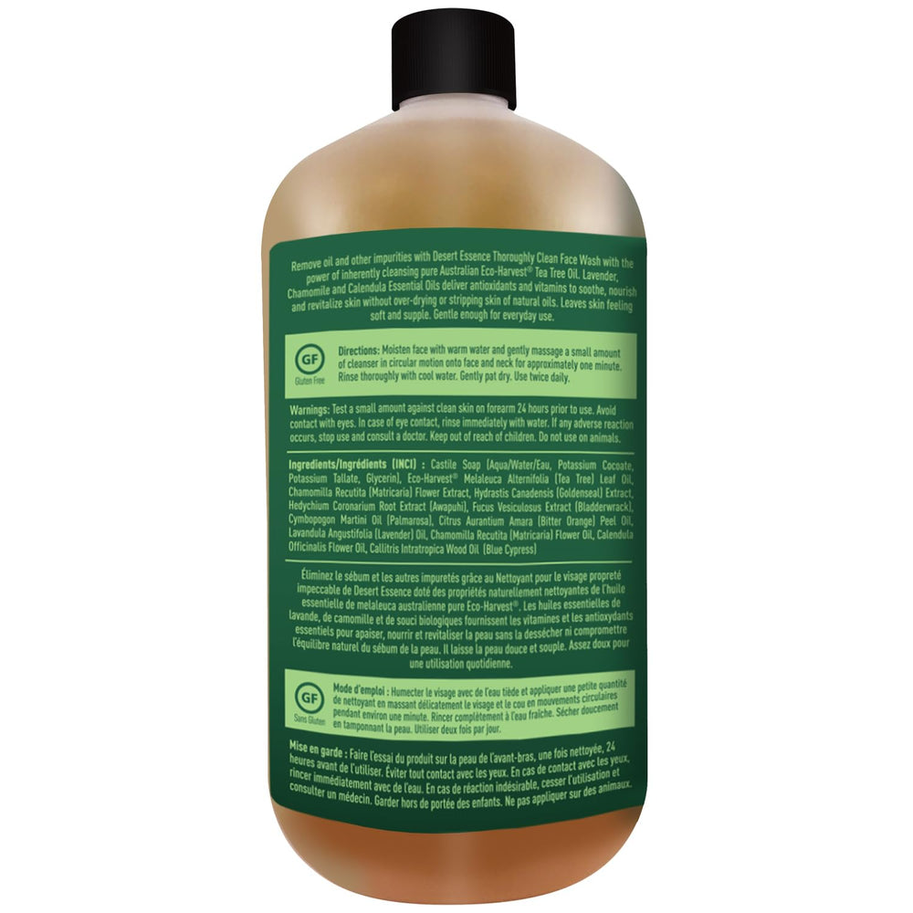 Desert Essence bottle held in hand to show 32 oz size and long-lasting supply