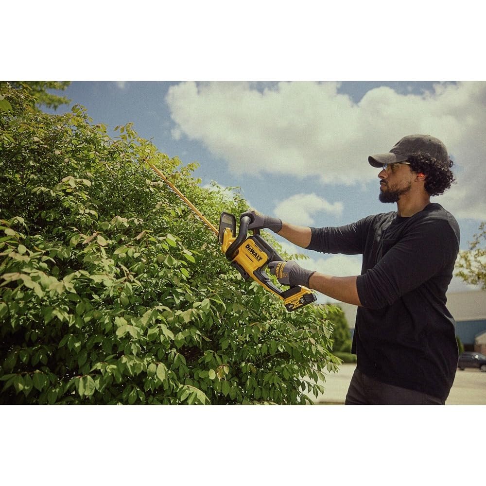DEWALT trimmer in a yard lifestyle shot illustrating professional finish and ease