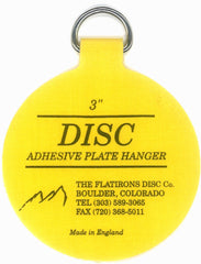 Disc primer plano del disco adherido al reverso de un plato, fijación invisible y segura