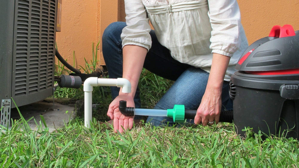 Diyvac attachment in use on AC drain reducing service time and effort