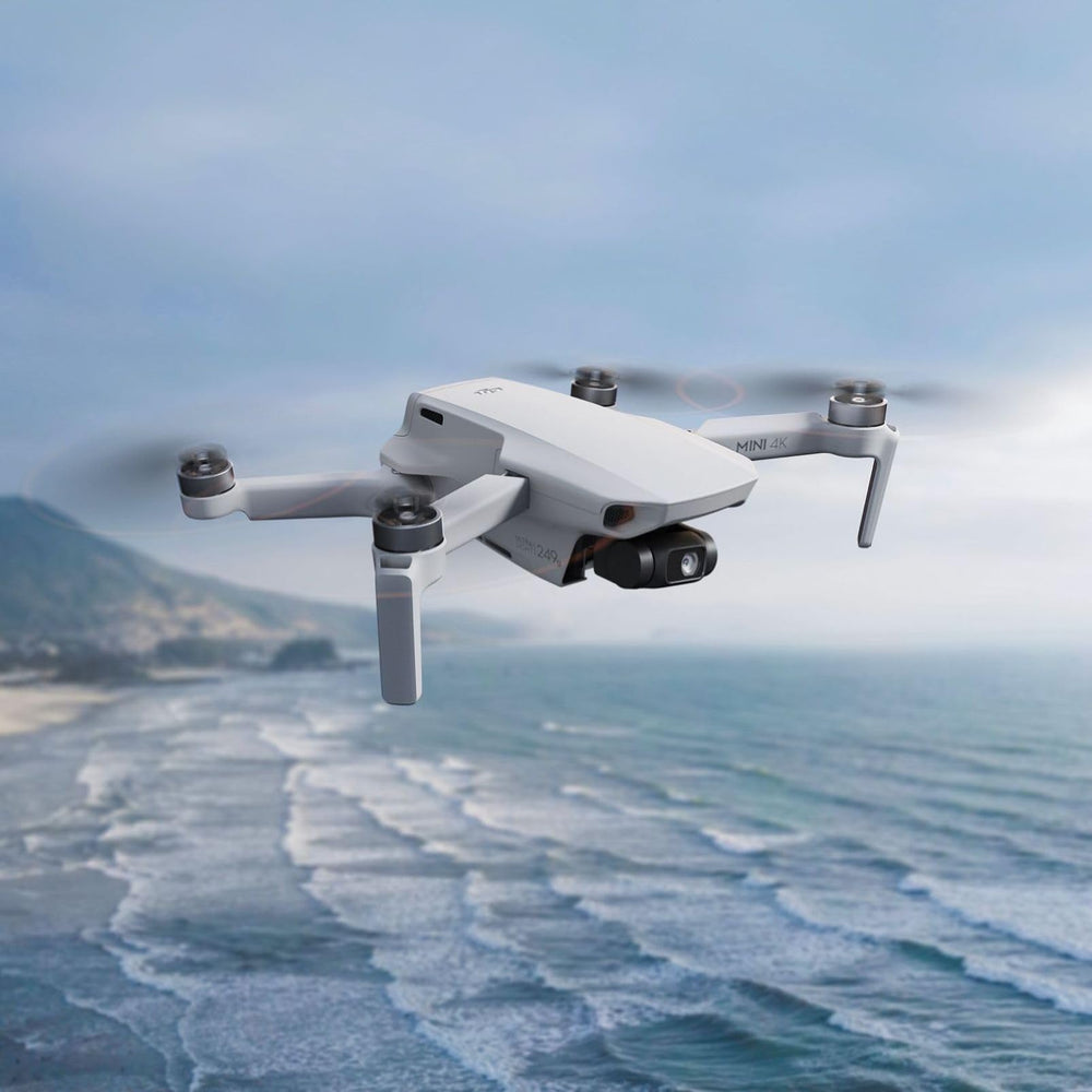 DJI Mini 4K capturing a beach sunset showing cinematic aerial footage
