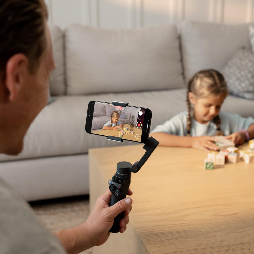 DJI Osmo Mobile 8 scale with hand illustrating lightweight, ergonomic benefit