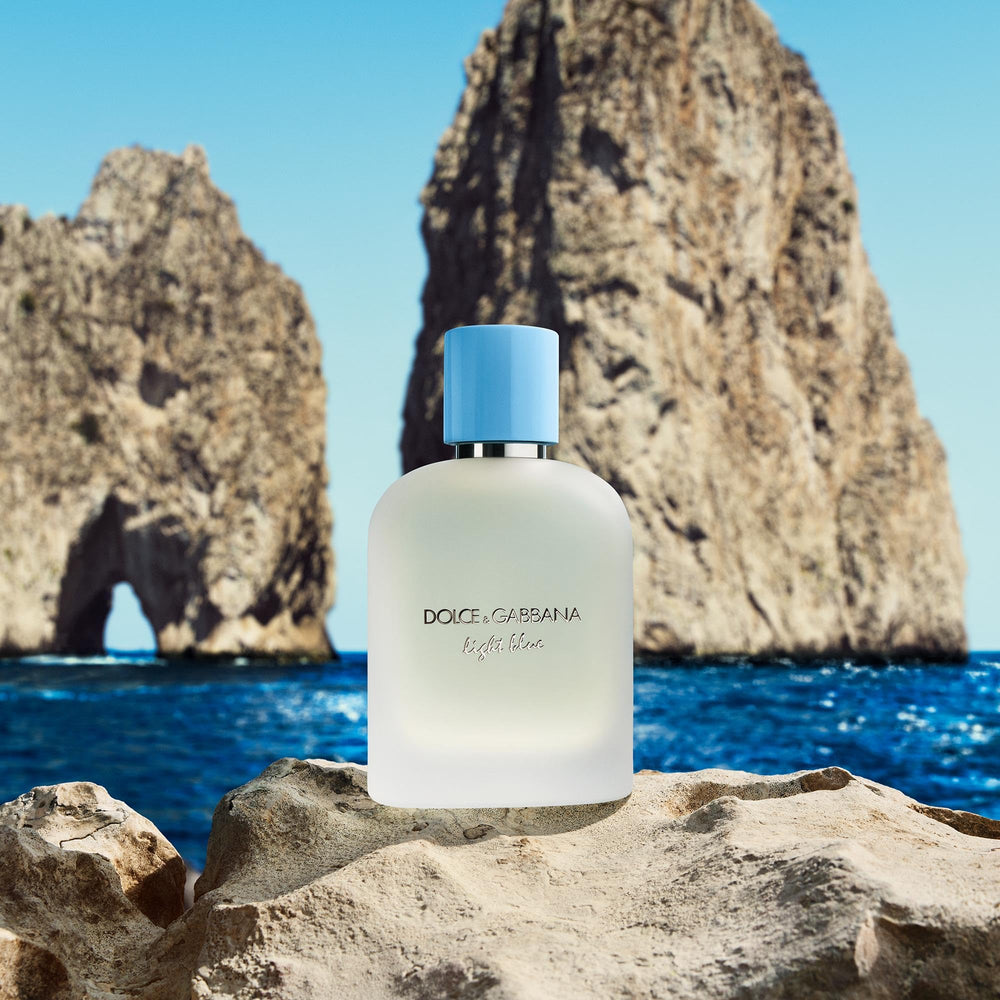 Dolce&Gabbana Light Blue 100 ml bottle beside common objects for scale convenience