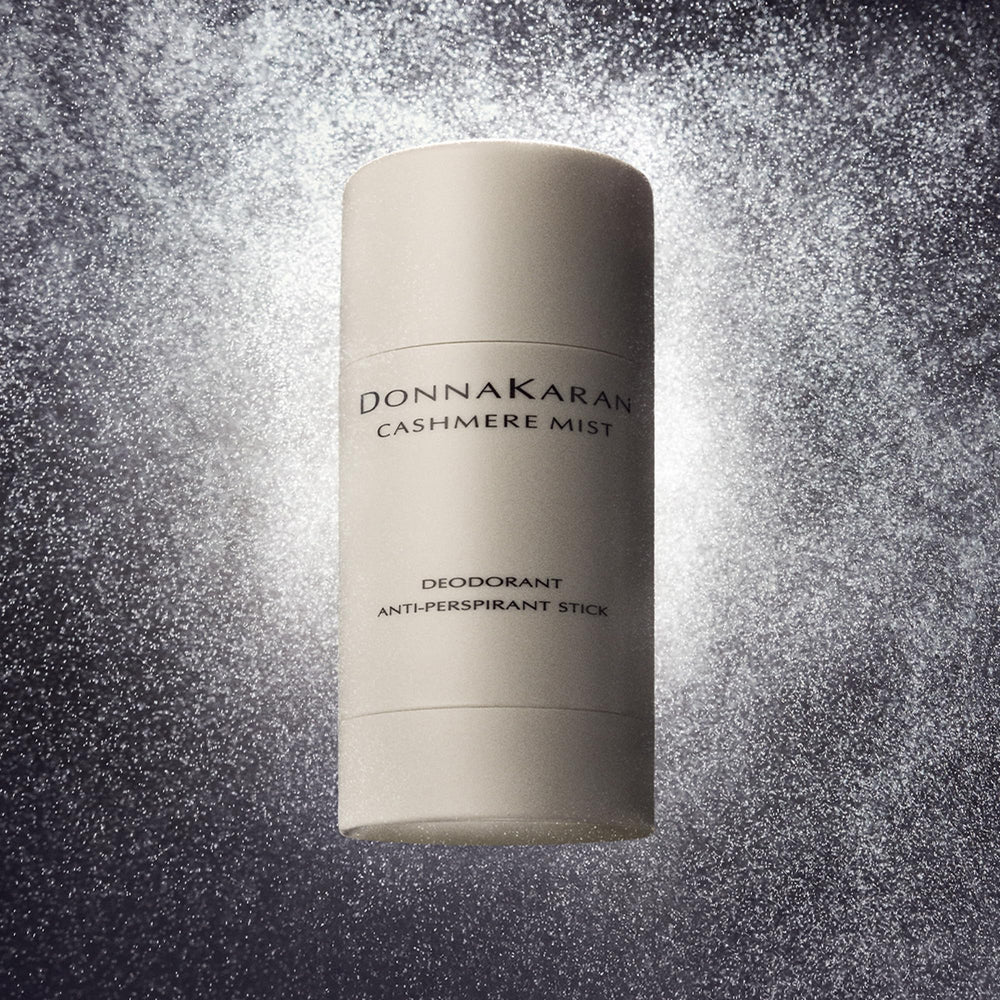 Donna Karan Cashmere Mist parte trasera del envase con instrucciones y tamaño de viaje