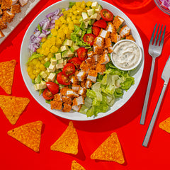 Single-serve Doritos bag opened in hand illustrating portable convenience and freshness