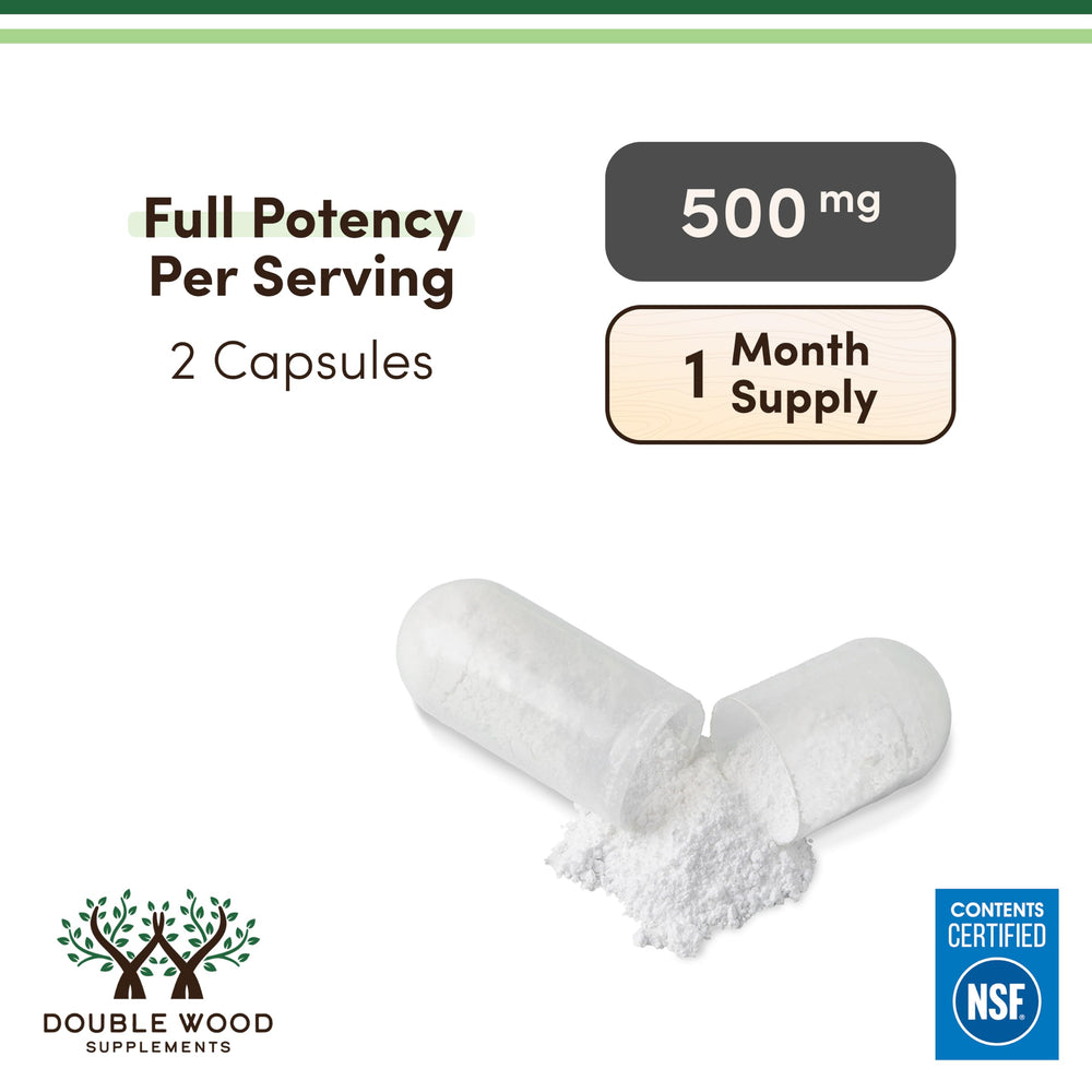 Double Wood TUDCA serving size spoon with capsules suggesting easy dosing