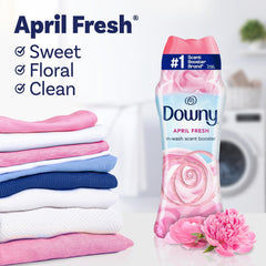 Downy envase en mano para comparar tamaño y dosis conveniente