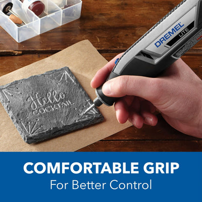 Person holding Dremel Lite demonstrating ergonomic grip and precise control