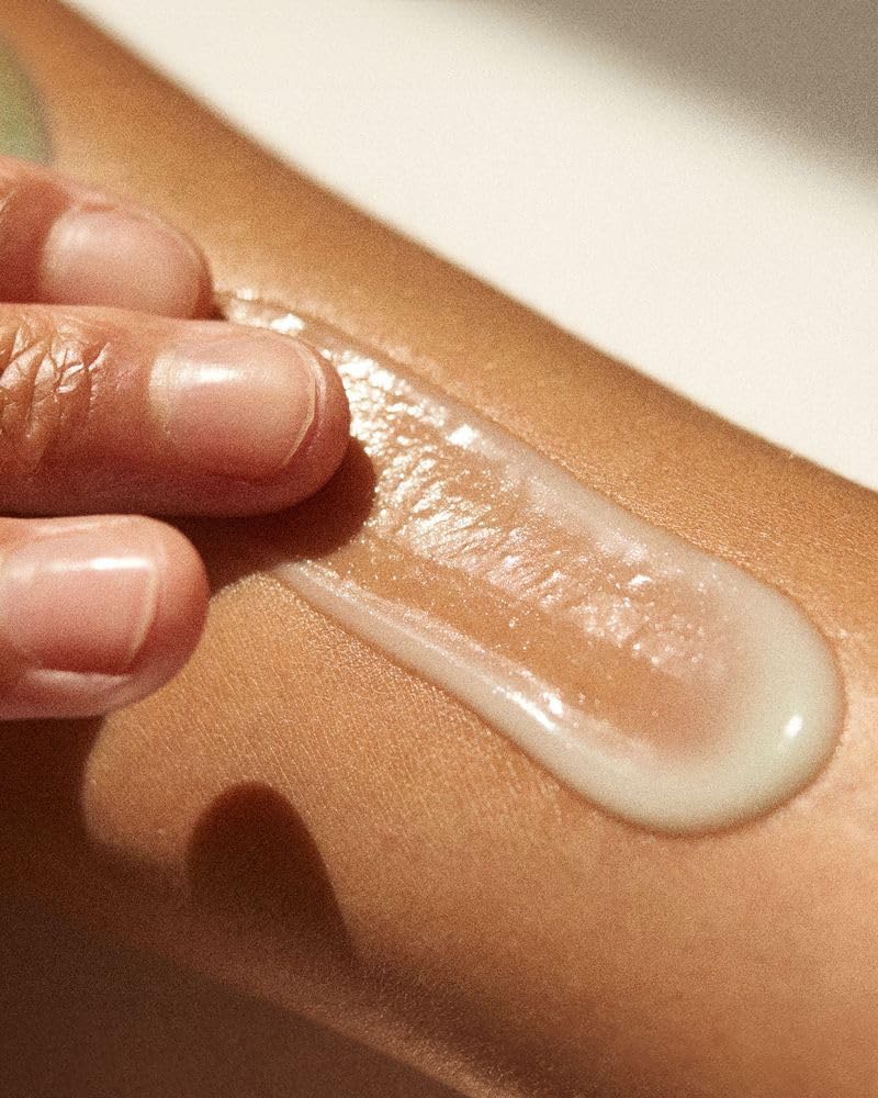 DUNE SUNCARE aplicación en mano del Bod Guard para protección rápida