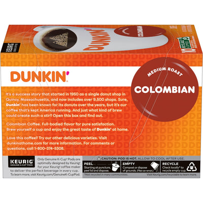 Hand holding a Dunkin' K-Cup pod to show size and single-serve convenience