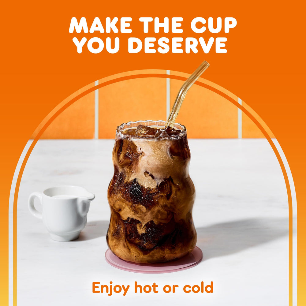 Dunkin' brewed cup poured with pod box behind showing ready-at-home flavor
