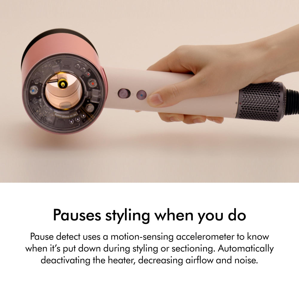 Dyson Supersonic Nural with styling concentrator attached demonstrating precise airflow for shaping