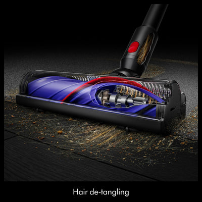 Dyson V8 cleaning stairs in handheld use showing stair and edge cleaning benefit