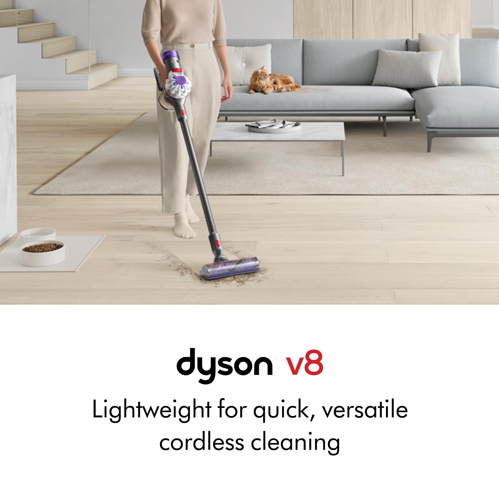 Dyson V8 Motorbar cleaner head close-up demonstrating de-tangling action for hair
