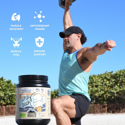 Earth Fed Muscle beside kitchen scale showing 29 servings per tub