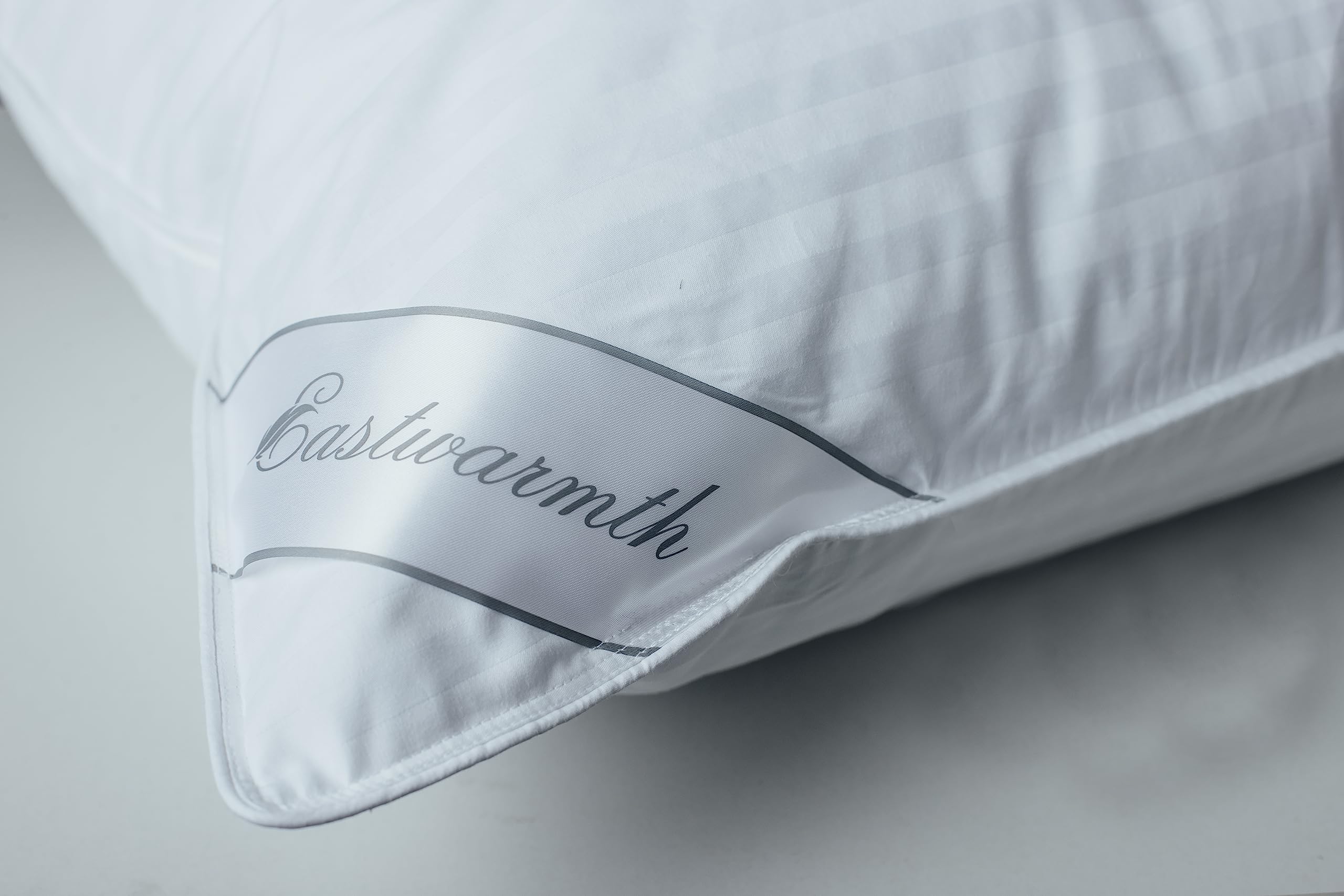 Eastwarmth almohada empaquetada en bolsa de fábrica garantizando higiene en envío