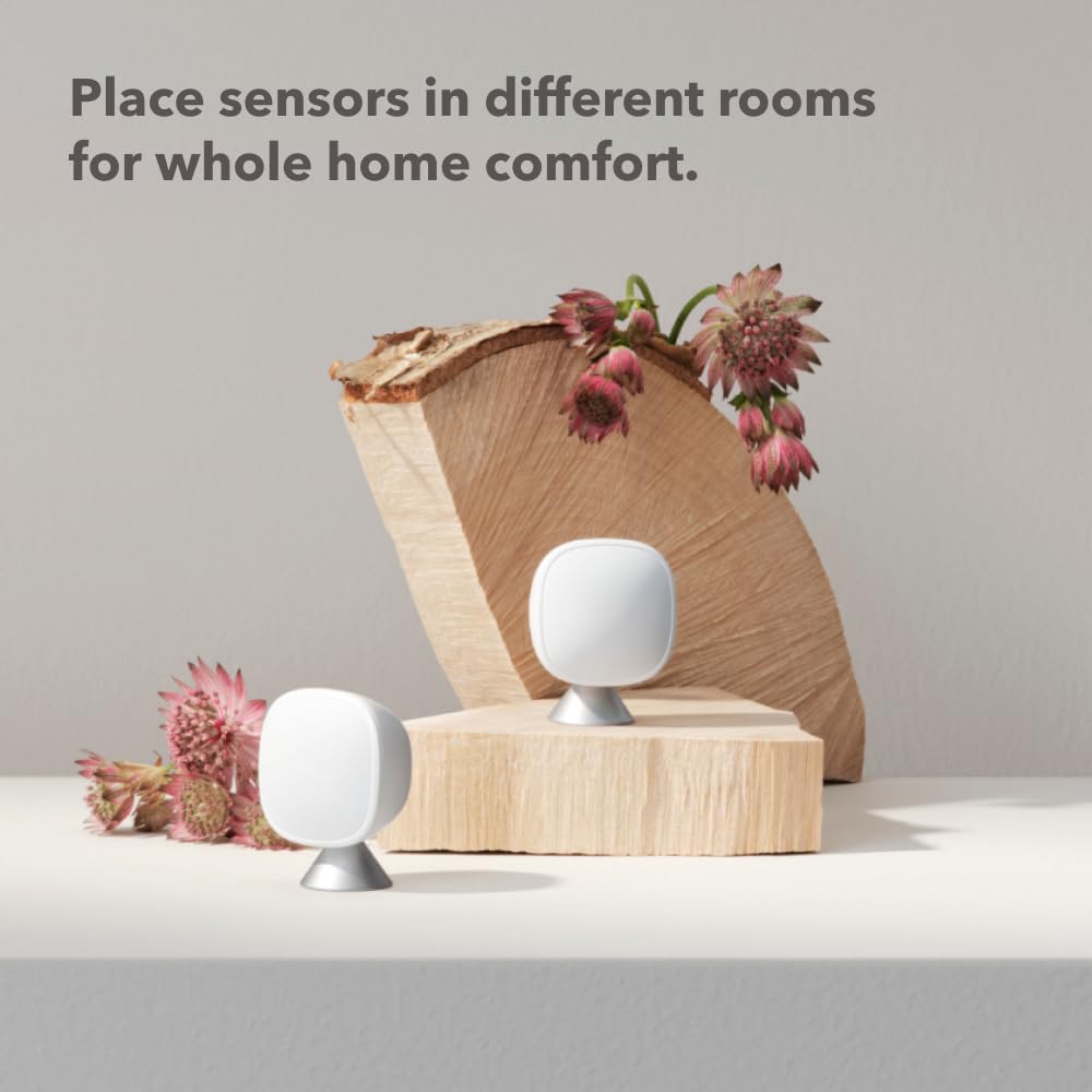 ecobee SmartSensor next to a hand to show scale and effortless installation benefit