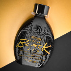 ED HARDY aplicación de Black XXX en brazo mostrando color instantáneo oscuro