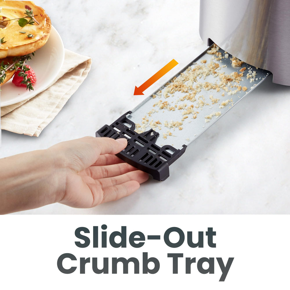 Elite Gourmet pulled-out crumb tray demonstrating quick cleanup and less countertop mess