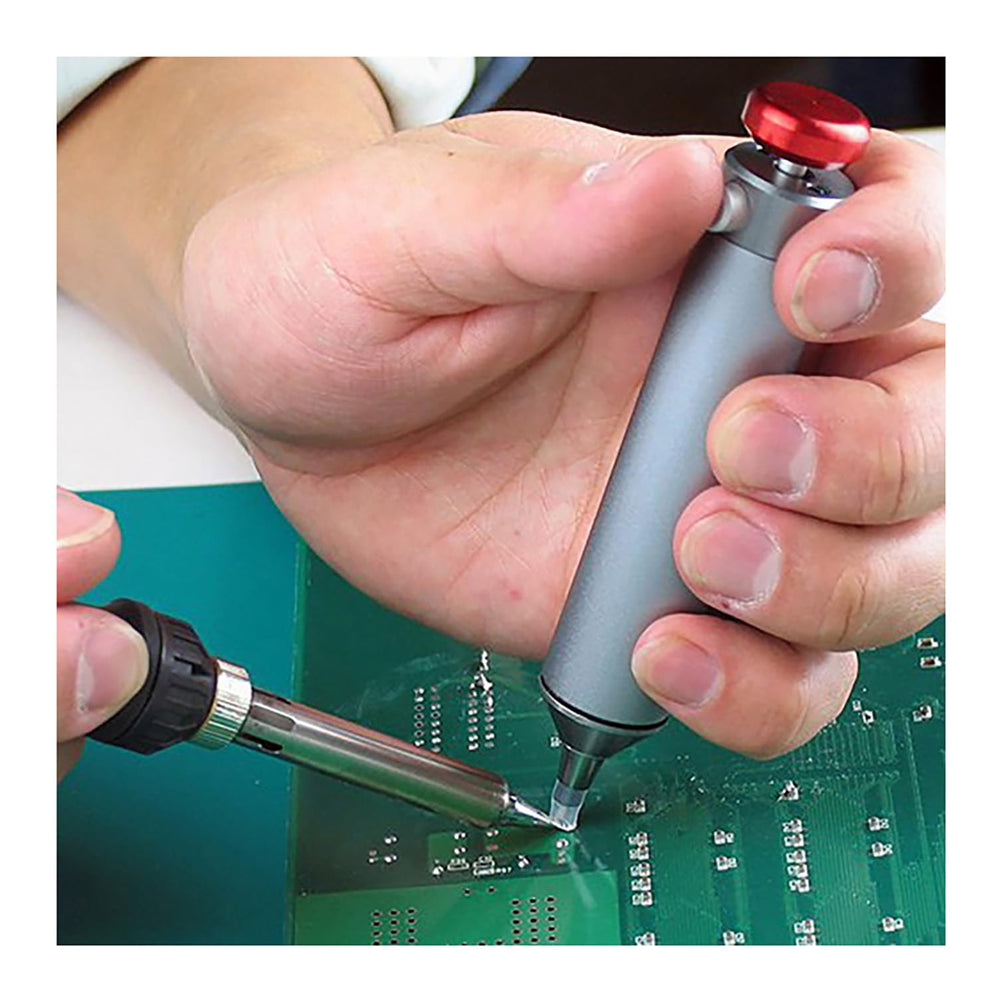 ENGINEER SS-03 en uso sobre placa electrónica mostrando extracción eficiente de estaño
