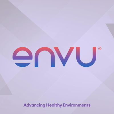 Envu technician wearing PPE while applying Tempo dust for professional safety