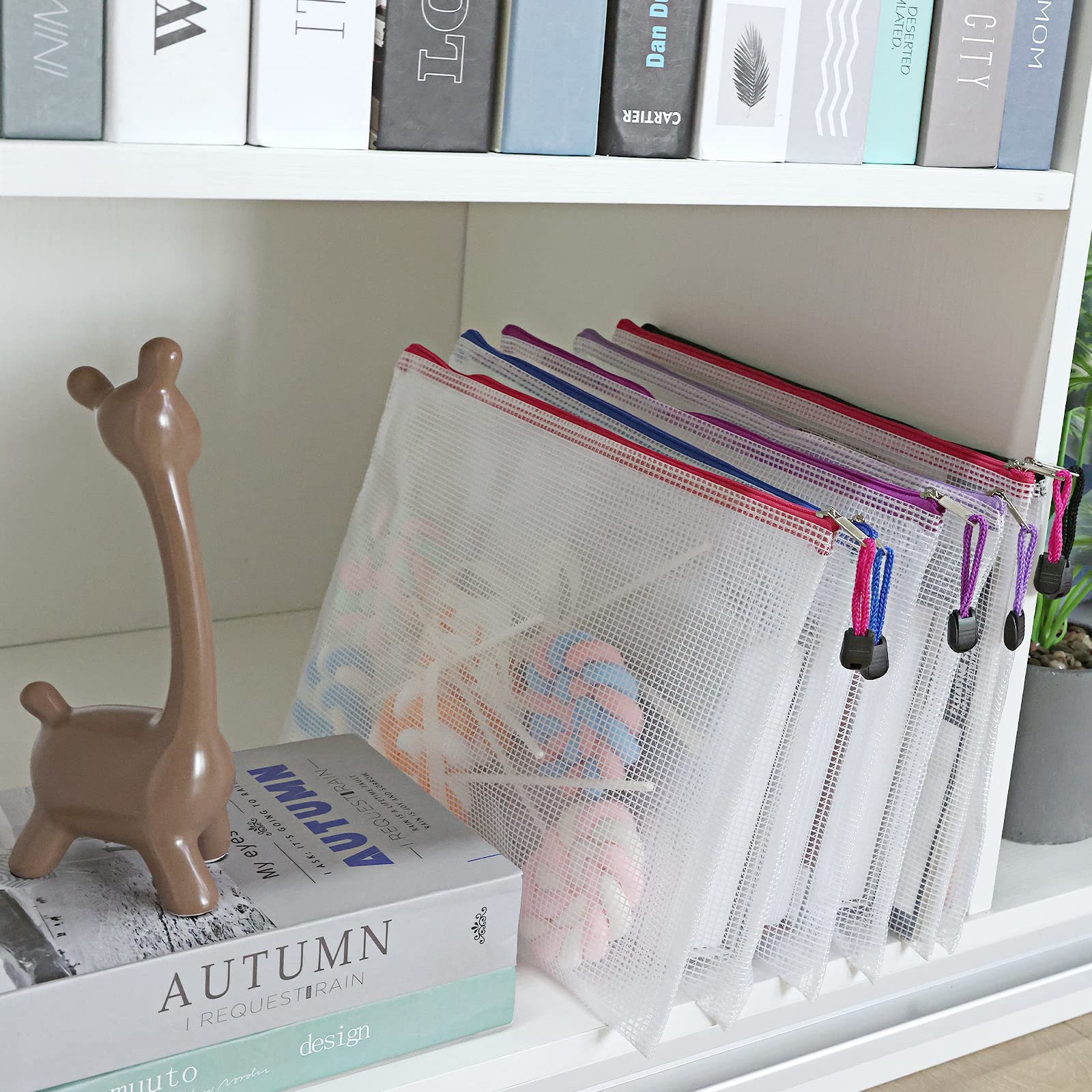 EOOUT pouches arranged on desk with stationery showing tidy workspace and fast access benefit