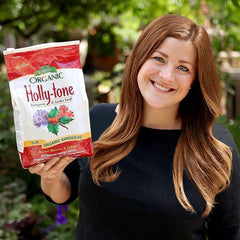 Espoma Holly-Tone bolsa de 4 lb junto a una regla para escala clara
