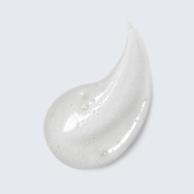 Estée Lauder cream texture close-up, shows rich conditioning formula benefit