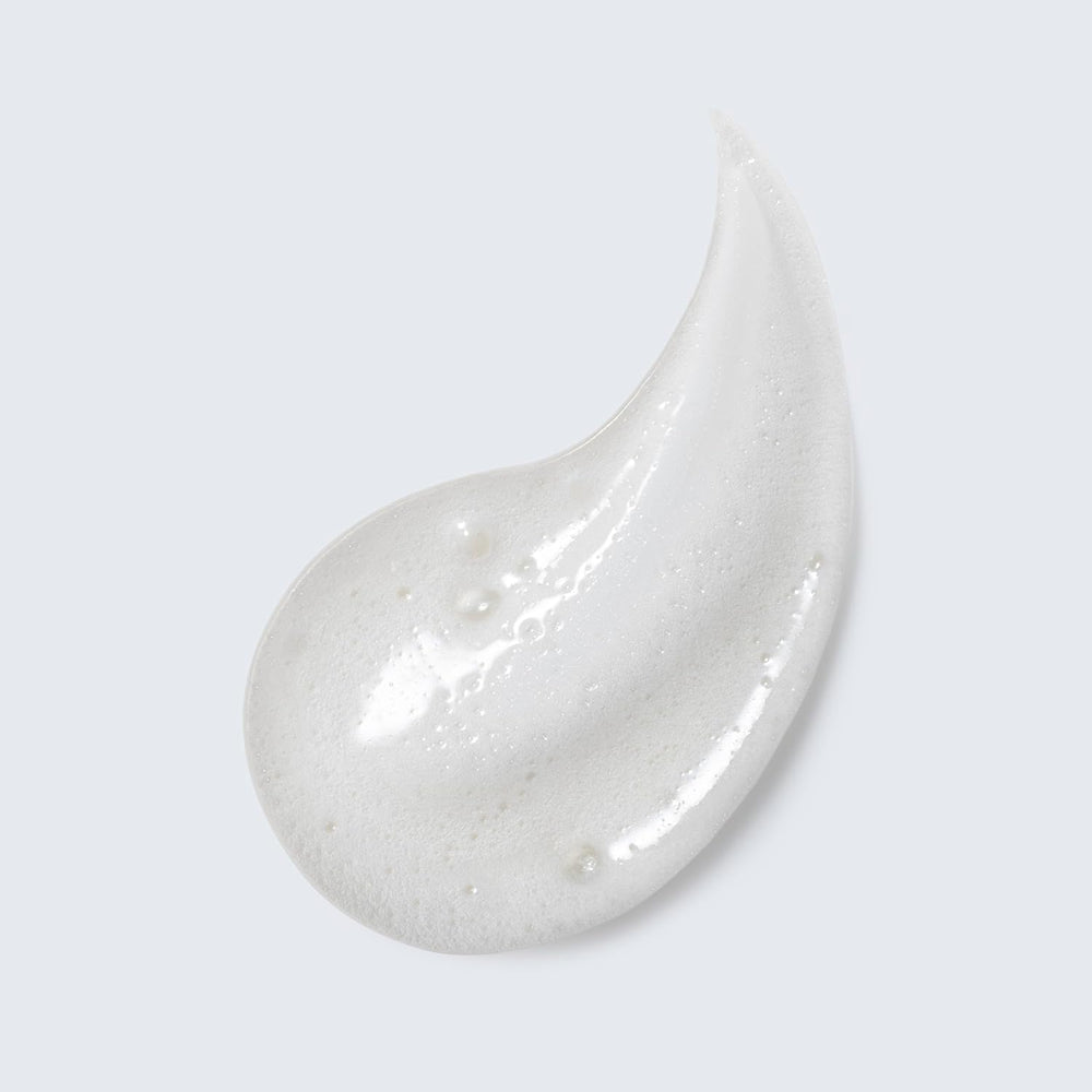 Estée Lauder cream texture close-up, shows rich conditioning formula benefit