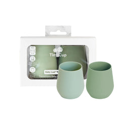 ezpz Tiny Cup frente con packaging, muestra seguro y tamaño práctico