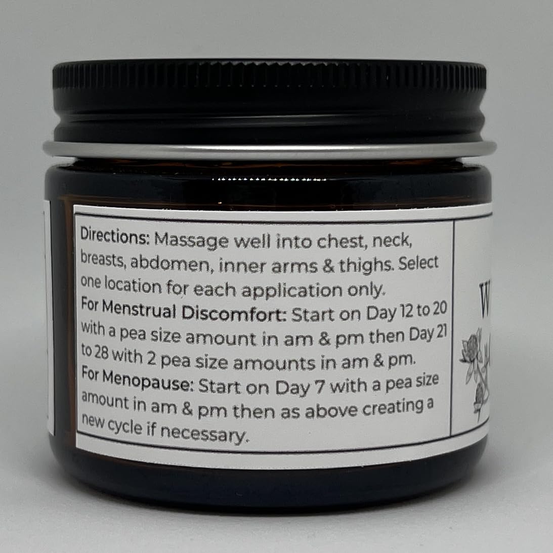 Faith and Grace Organics crema aplicada en mano ilustrando tamaño 2 oz y fácil uso diario