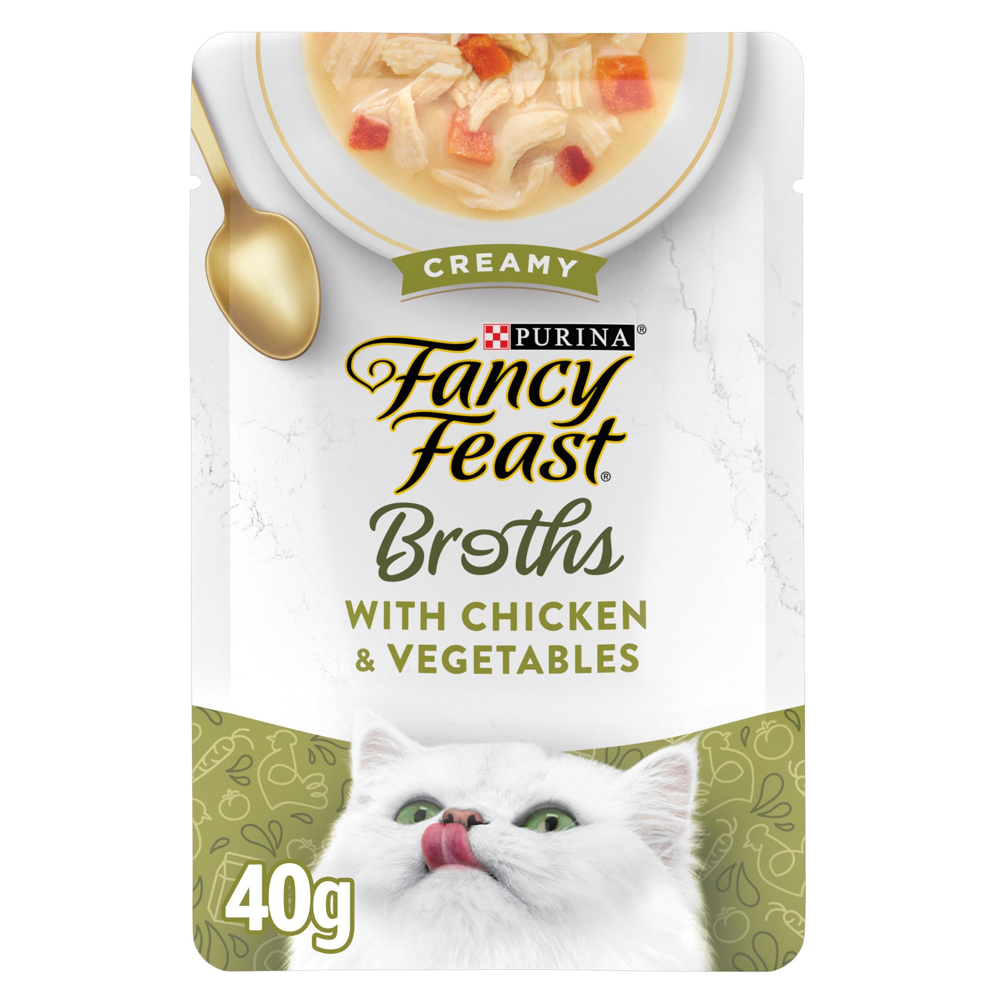 Fancy Feast caldo vertido sobre pienso mejorando aroma y humedad del alimento