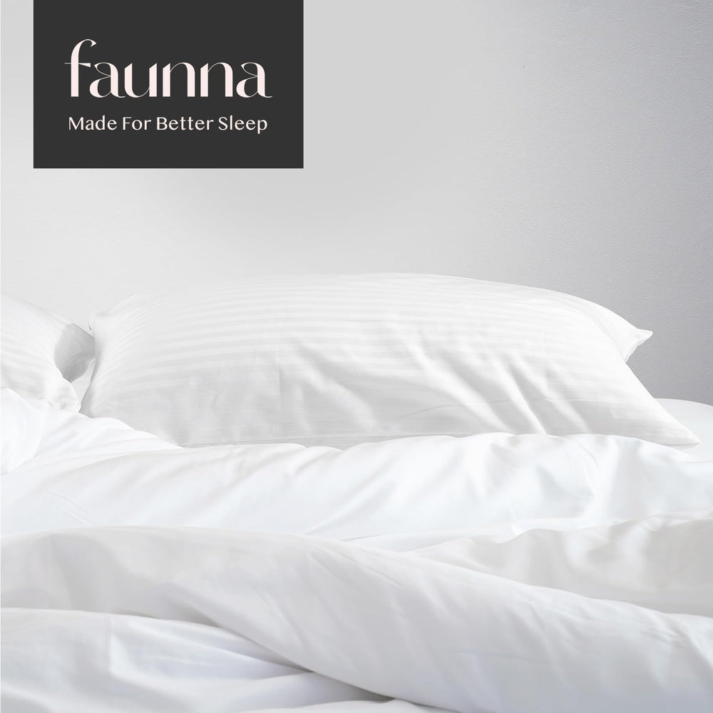 FAUNNA styled guest room with protectors showing cohesive white bedding and polished look