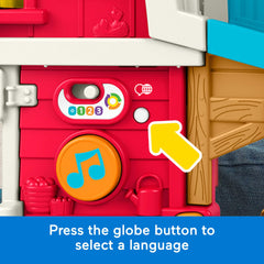 Fisher-Price niño pequeño usando la granja activando música para estimular juego y lenguaje