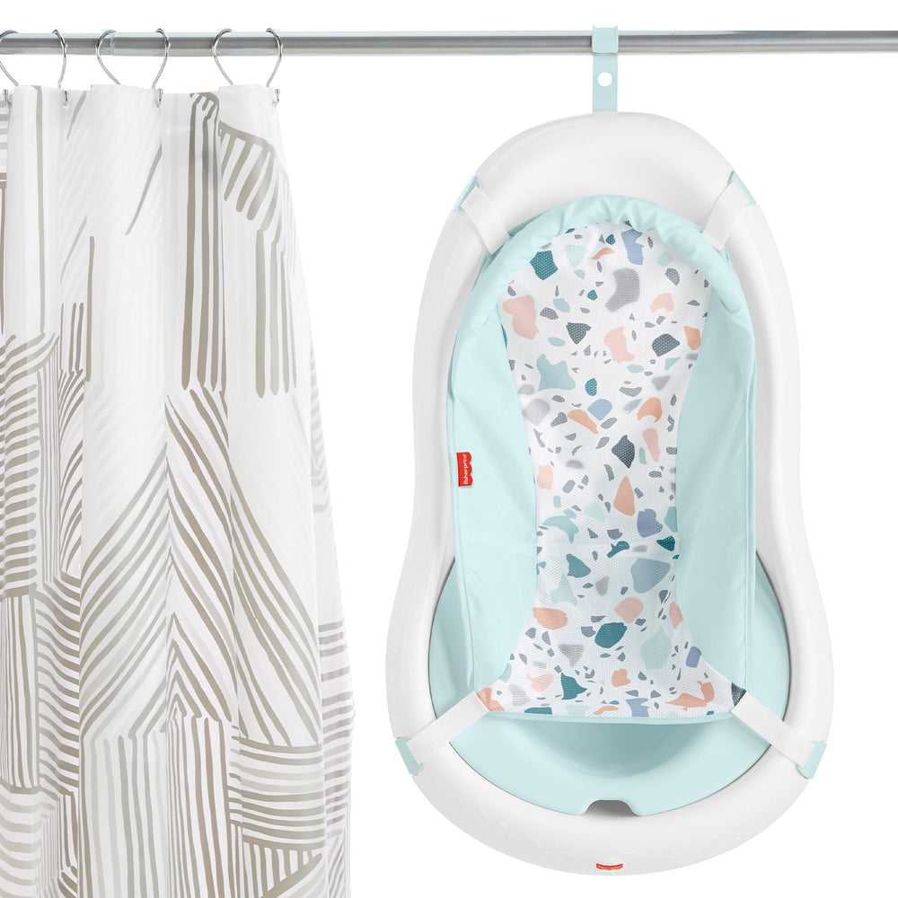 Fisher-Price included whale and geyser toys encouraging playful bathing