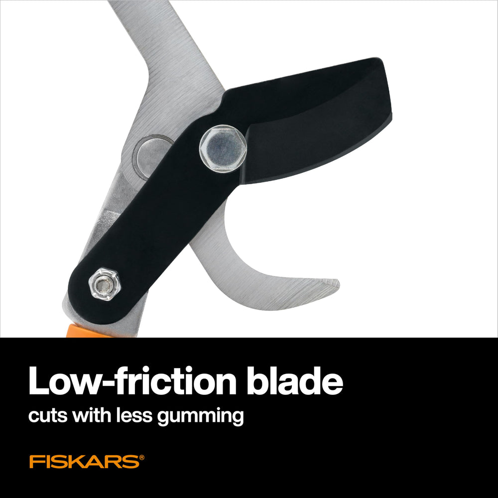 Fiskars lopper cutting a branch demonstrating effortless pruning action