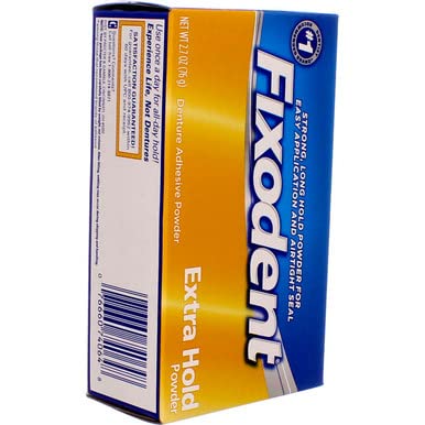 Fixodent junto a una regla para comparar tamaño y demostrar facilidad de almacenamiento