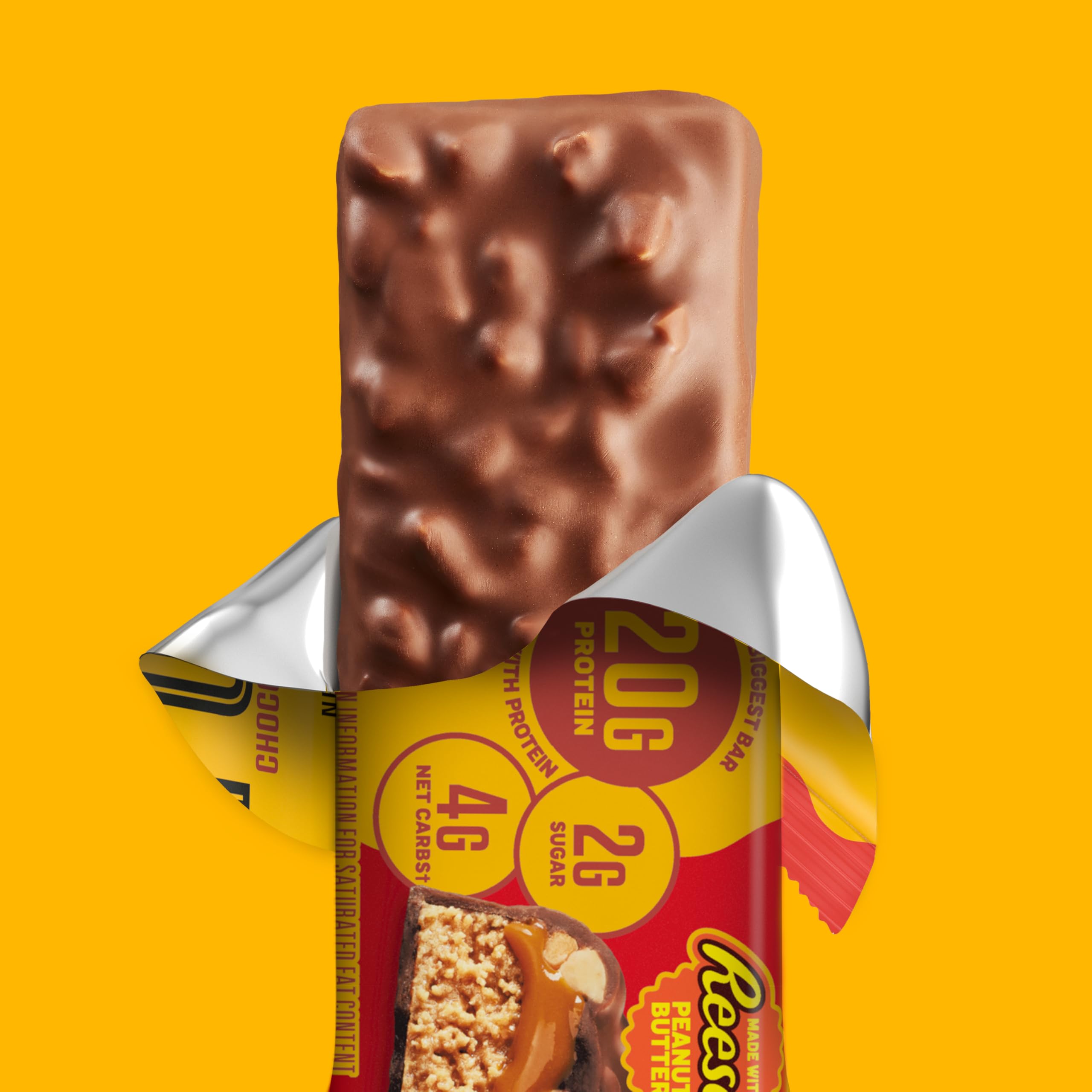 FULFIL Reese's corte mostrando centro cremoso de mantequilla de cacahuete y doble cobertura chocolate