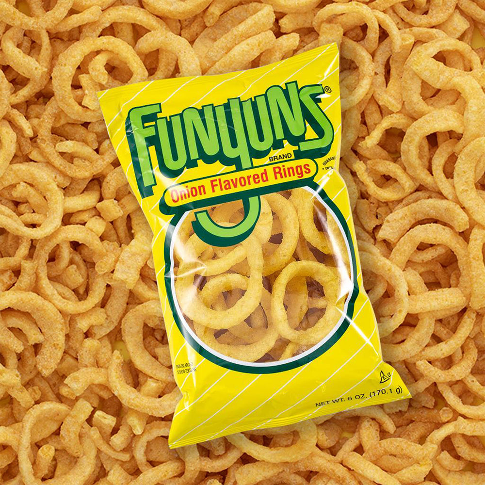 Funyuns bag held in hand to show brand and portable snack size