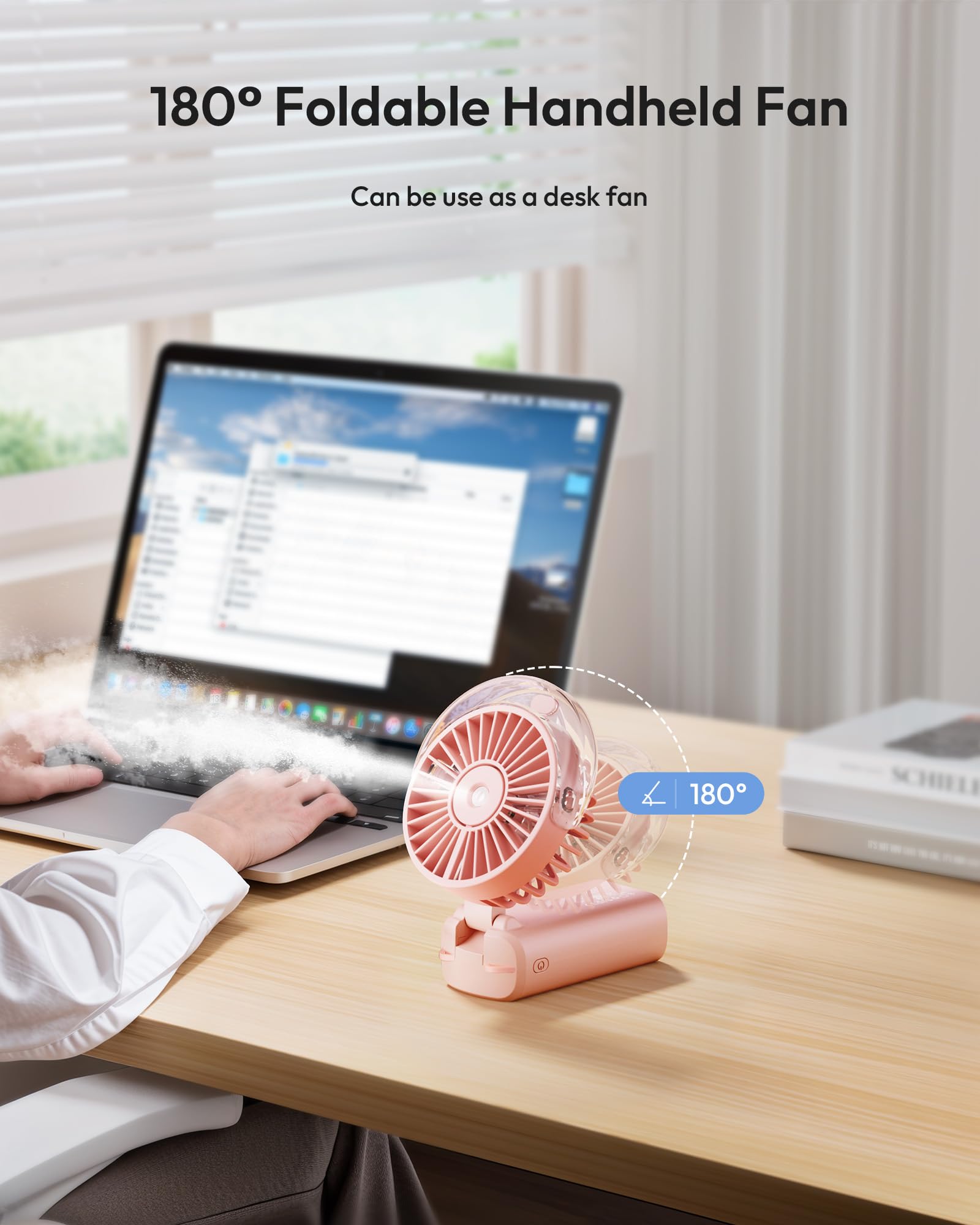 Gaiatop ventilador plegado junto a teléfono para referencia de tamaño