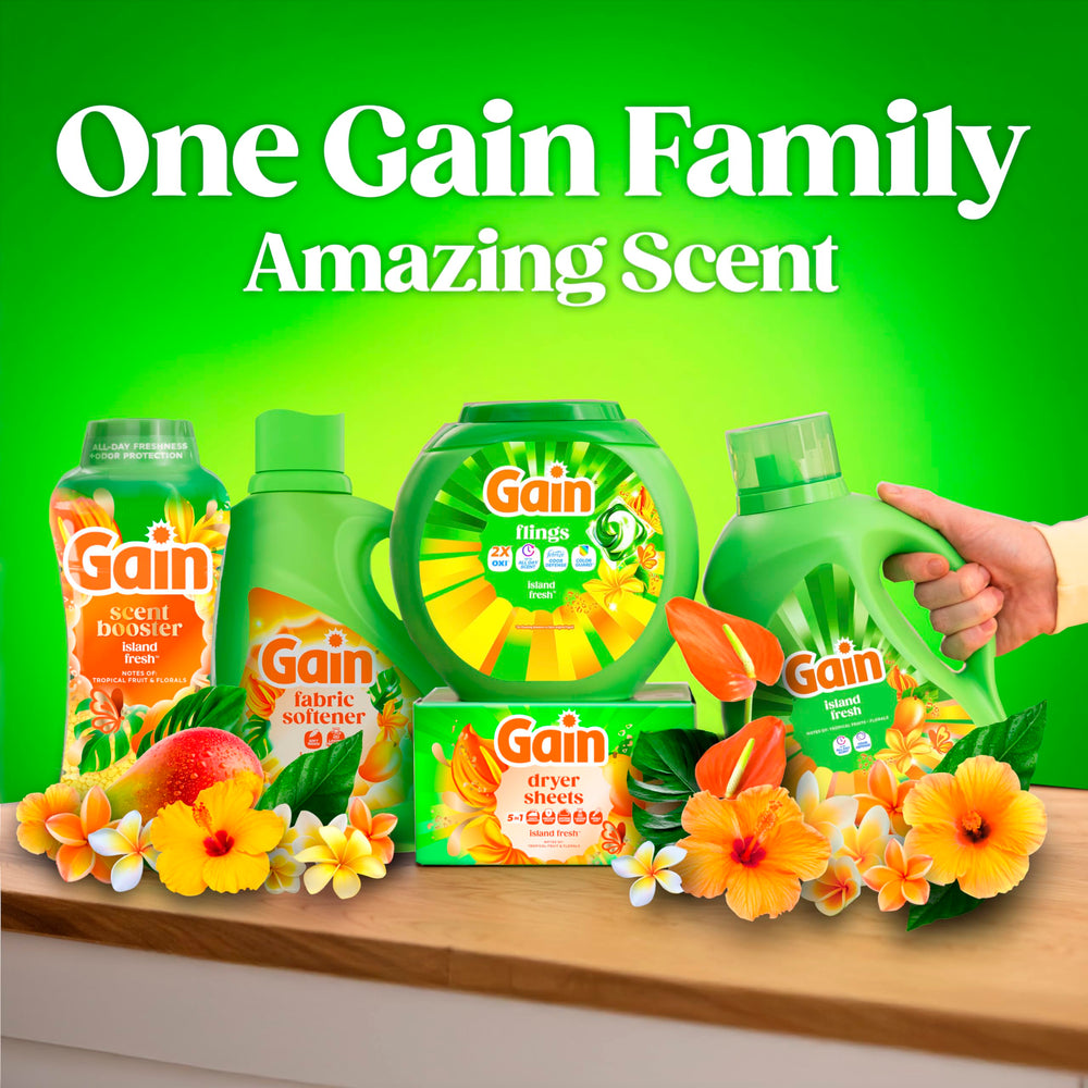 Escena doméstica con cesto de ropa perfumada tras lavado con Gain Flings
