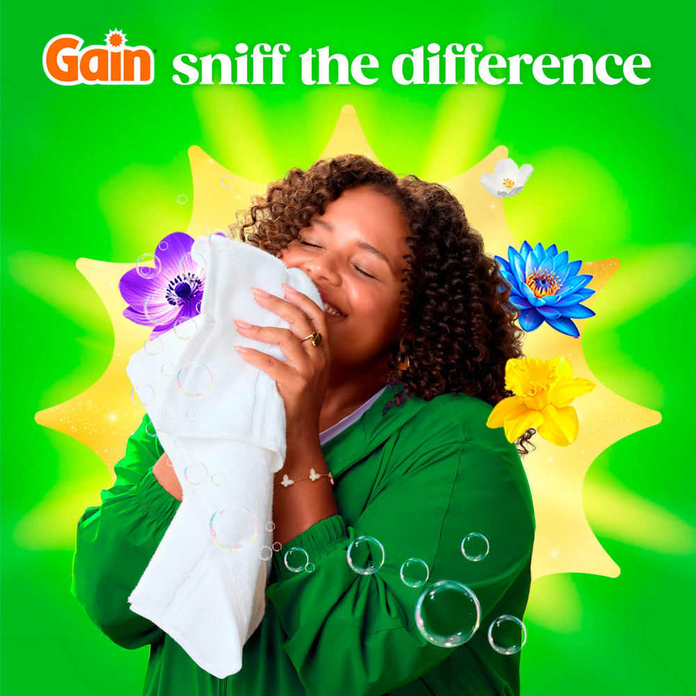 Tapa abierta de Gain Flings mostrando fácil acceso y dosificación segura