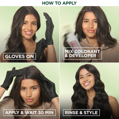 Garnier mujer sonriente tras teñirse en casa luz natural mostrando color vibrante y confianza