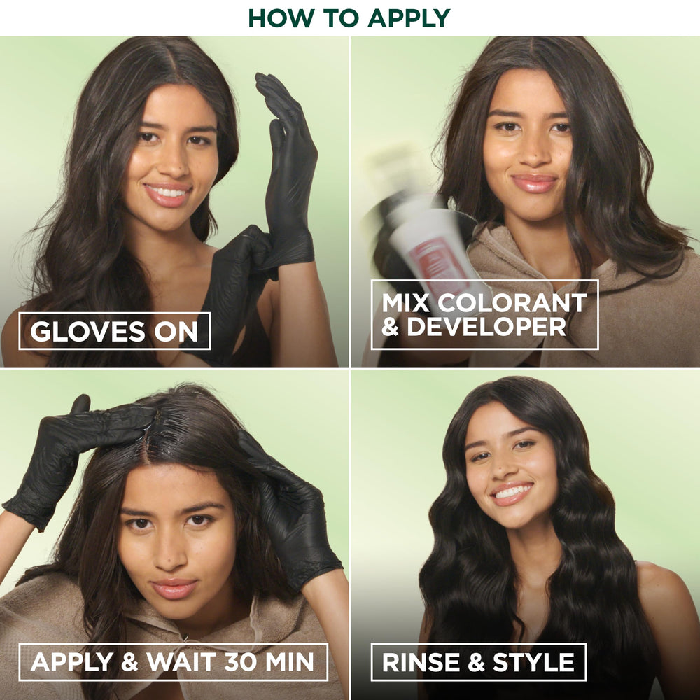 Garnier mujer sonriente tras teñirse en casa luz natural mostrando color vibrante y confianza