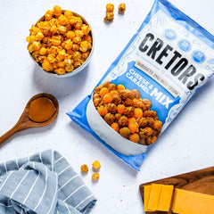 G.H. Cretors primer plano de caramelo brillante en palomitas, resalta textura
