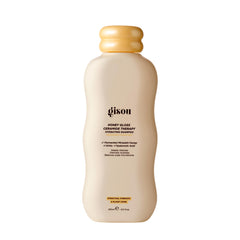 Gisou envase frontal del champú mostrando diseño y beneficio hidratante