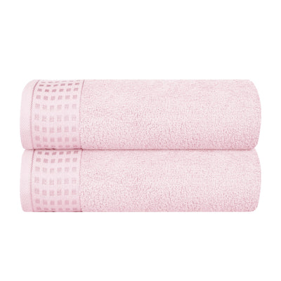 GLAMBURG toalla frontal empacada mostrando color rosa y tamaño práctico