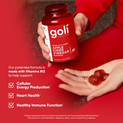 Goli open bottle with gummies on a spoon, showing chewable serving ease